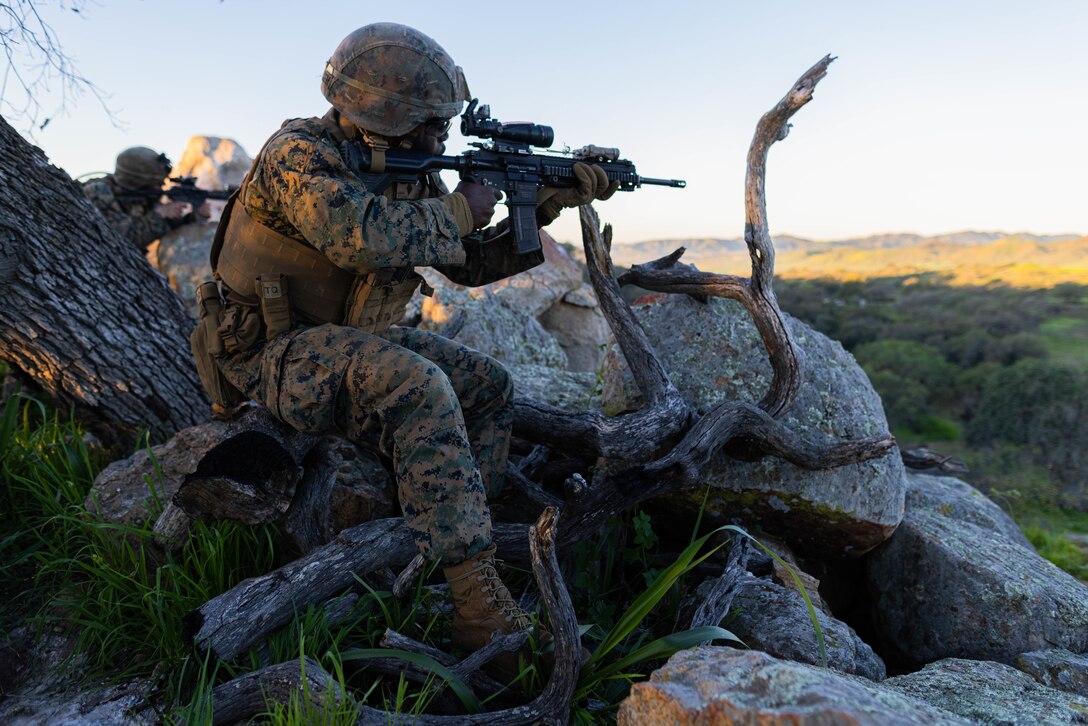 U.S. Marine Lance Cpl. Stephane Mbaytessem, a rifleman with Bravo Company, 1st Light Armored Reconnaissance Battalion, 1st Marine Division, fires down range during the annual 1st MARDIV squad competition on Marine Corps Base Camp Pendleton, California, Feb. 9, 2023. The week-long competition incorporates a variety of combat-related tasks designed to evaluate each squad’s proficiency. Mbaytessem is a native of the Central African Republic. (U.S. Marine Corps photo by Lance Cpl. Juan Torres)