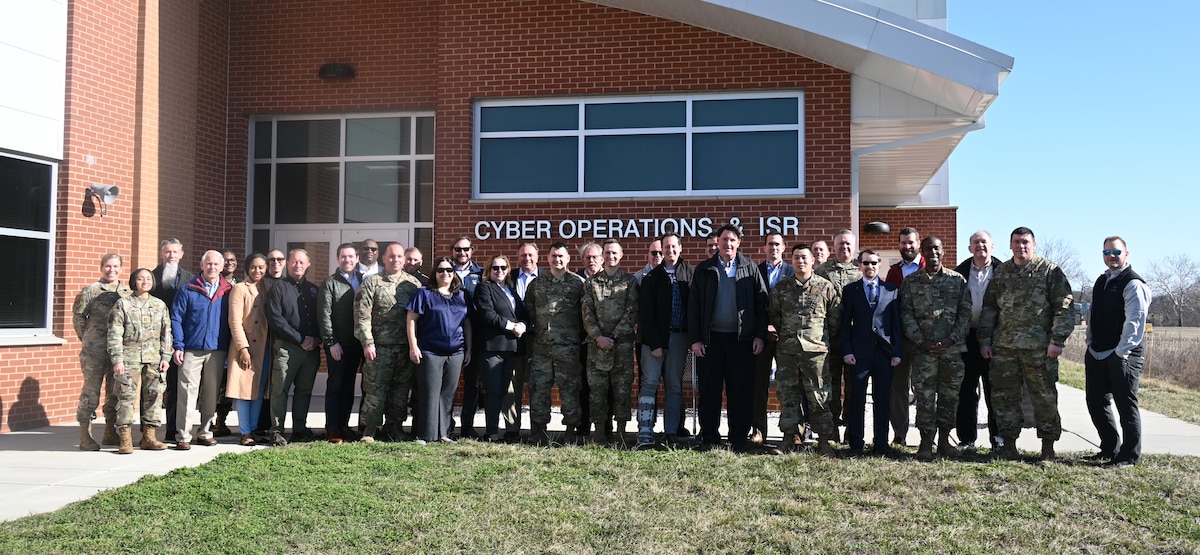 Members of the 275th Cyberspace Operations Squadron and their civilian employers pose for a photograph at Martin State Air National Guard Base, Middle River, Md., March 24, 2023.