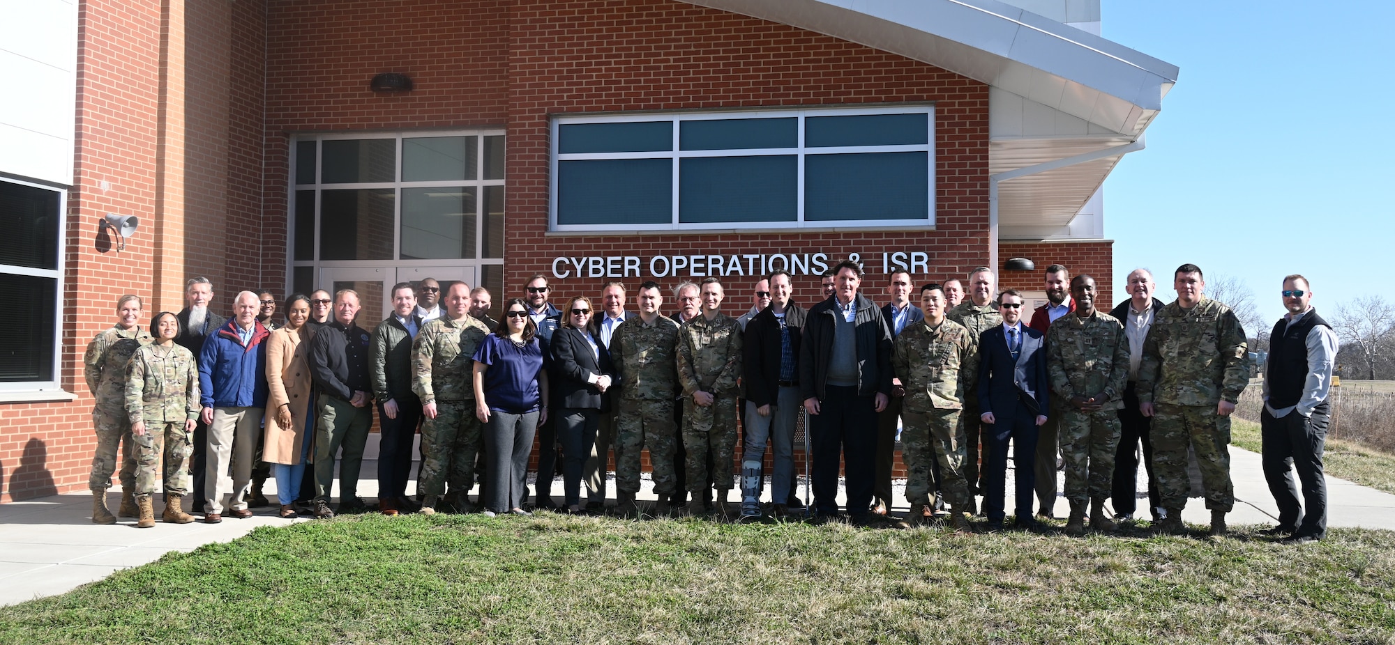 Members of the 275th Cyberspace Operations Squadron and their civilian employers pose for a photograph at Martin State Air National Guard Base, Middle River, Md., March 24, 2023.
