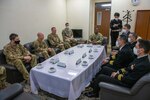 Leaders of the 374th Airlift Wing, 432nd Air Expeditionary Wing, and 319th Expeditionary Reconnaissance Squadron meet with members of Japan Maritime Self-Defense Force Fleet Air Wing One and Air Patrol Squadron One on Kanoya Air Base, Japan, Feb. 23, 2023. 374th AW and 432nd AEW leadership visited the 319th ERS to meet with and thank the Airmen for their work to maintain and operate the squadron's MQ-9 Reaper aircraft and for building relationships with their host JMSDF partners and the local Japanese community. The 319th ERS MQ-9s support Japan–U.S. intelligence, surveillance, and reconnaissance priorities throughout the Indo-Pacific, sending information they capture to the Bilateral Intelligence Analysis Cell on Yokota Air Base for review and processing by a combined U.S.-Japan team.