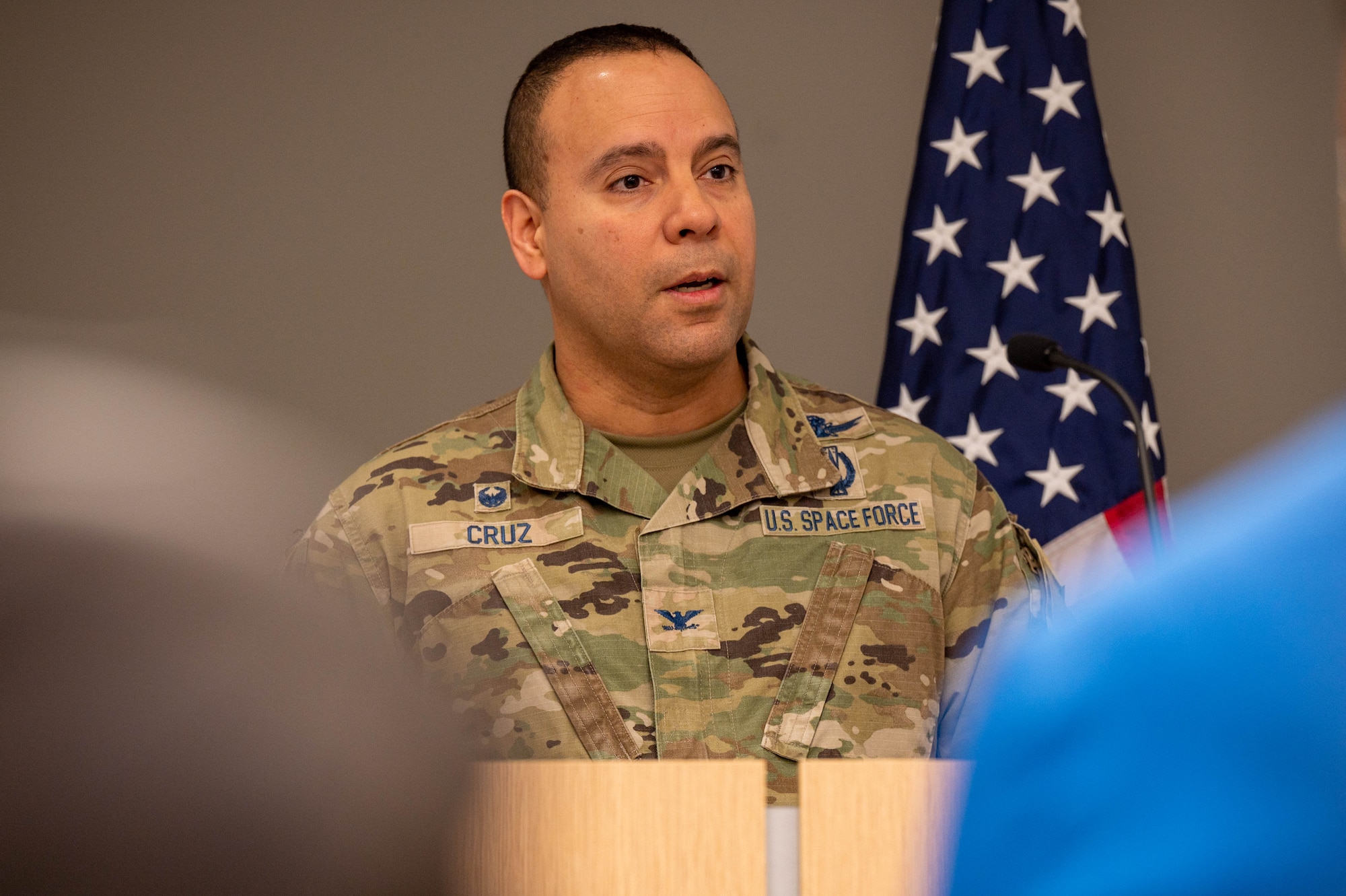 U.S. Space Force Col. Miguel Cruz, Space Delta 4 commander, speaks on the importance of Defense Support Program satellites during a DSP retirement ceremony at Buckley Space Force Base, Colo., March 2, 2023. DSP satellites are a significant contributor of the United States’ Early Missile Warning and Tracking enterprise. (U.S. Space Force photo by Airman 1st Class Shaun Combs)