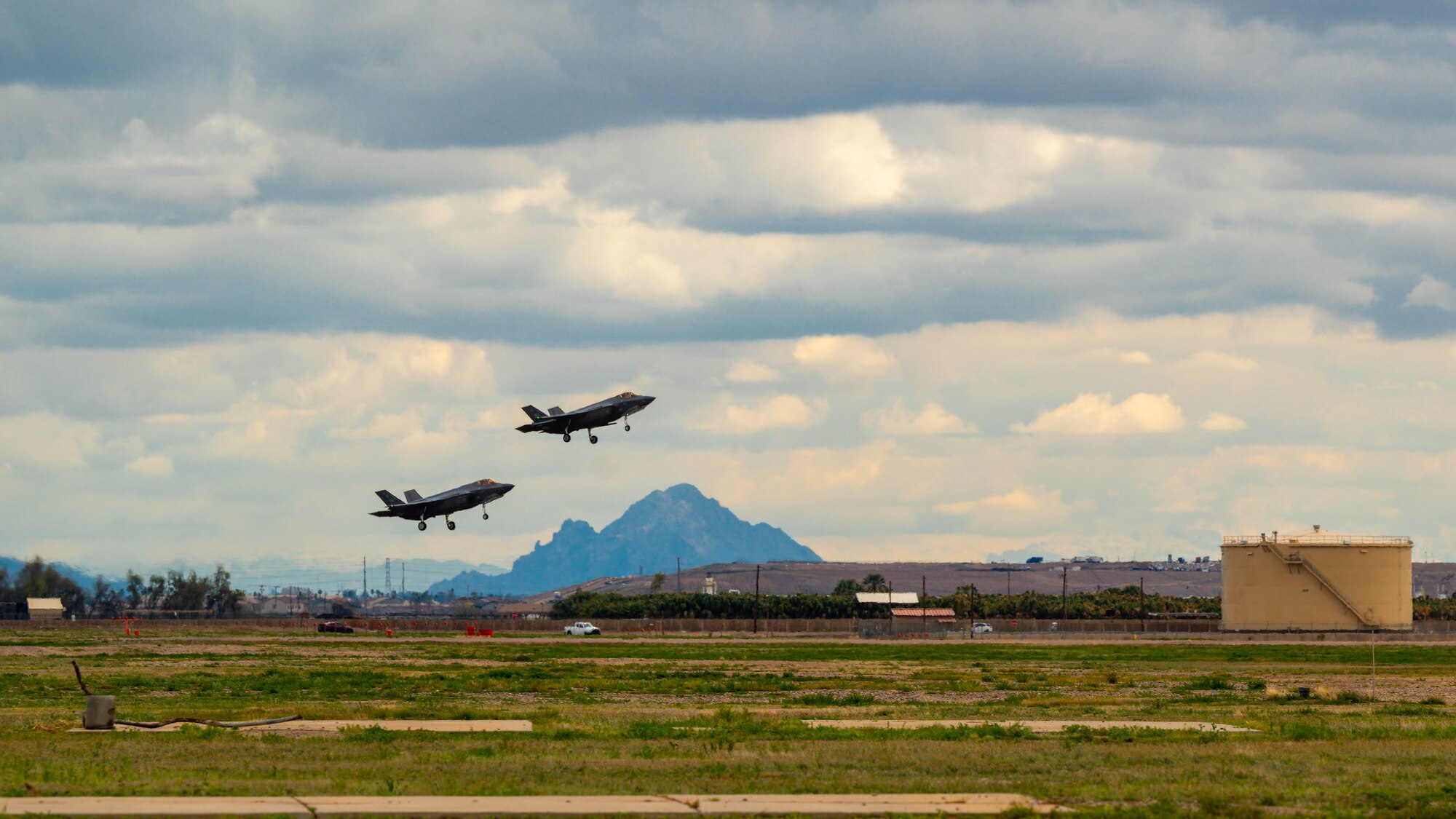 Two F-35A Lightning II aircraft land March 2, 2023, at Luke Air Force Base, Arizona.