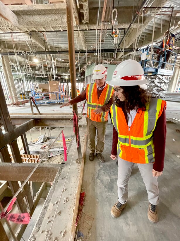 Imad Slaiwa, a U.S. Army Corps of Engineers Los Angeles District supervisory civil engineer, left, points out details of the under-construction Spinal Cord Injury/Community Living Center to Cheree Peterson, the Corps’ South Pacific Division regional business director, during her visit to the Veterans Affairs San Diego Health Care System campus Feb. 17 in San Diego.