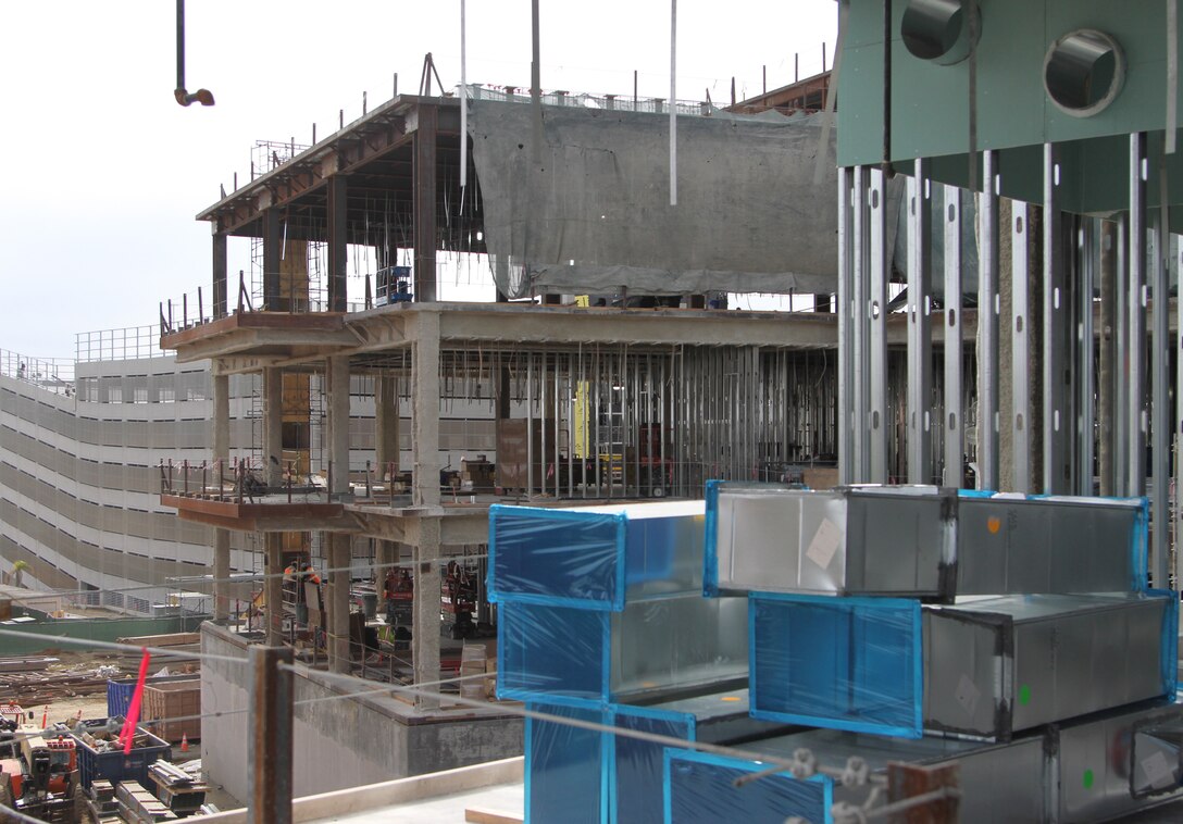 The Spinal Cord Injury/Community Living Center and the nearly complete seven-story parking garage, both still under construction, are pictured at the Veterans Affairs San Diego Health Care System campus Feb. 17 in San Diego.