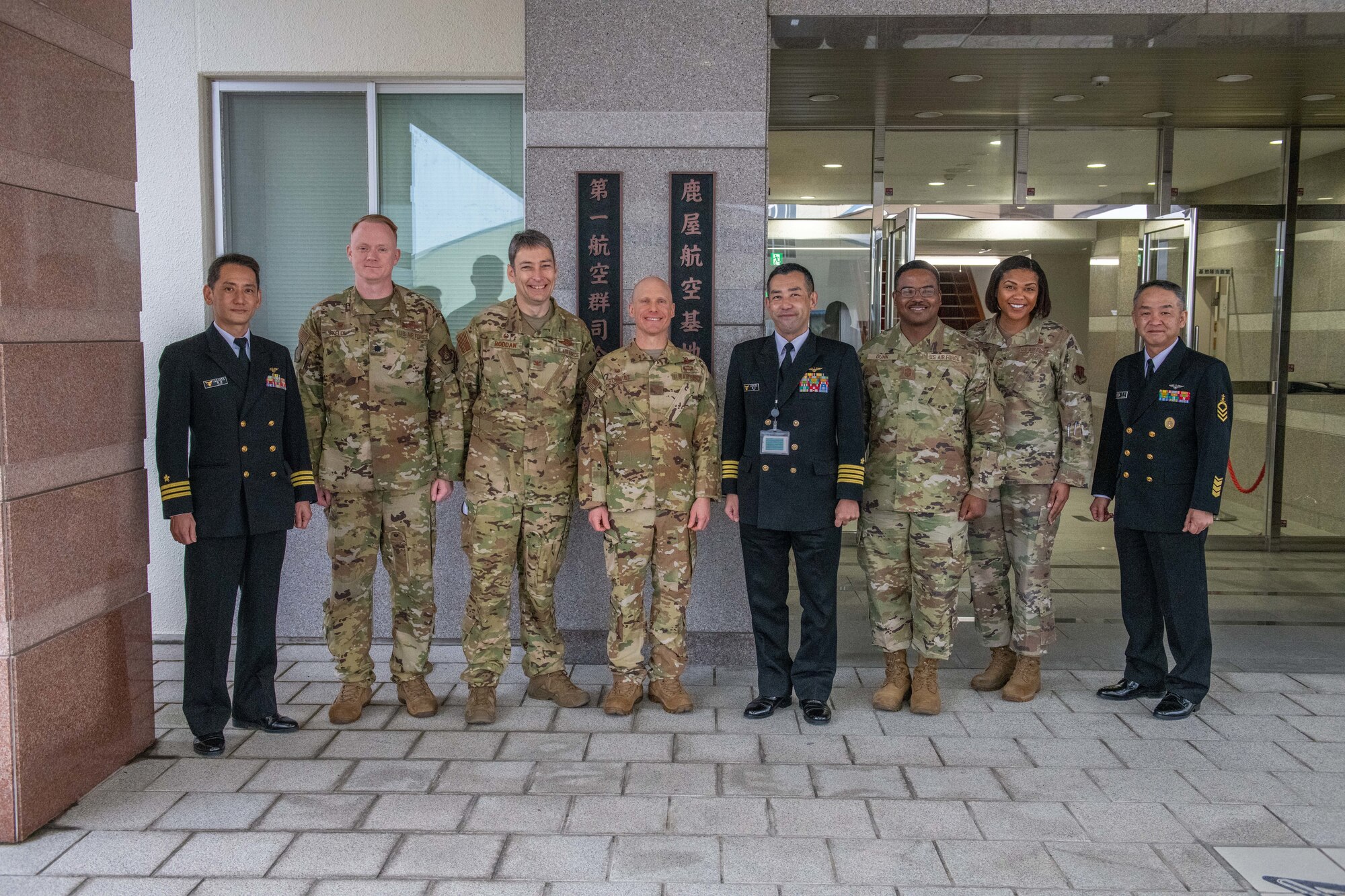 U.S. Air Force leadership and Japan Maritime Self-Defense Force stand together for a group photo