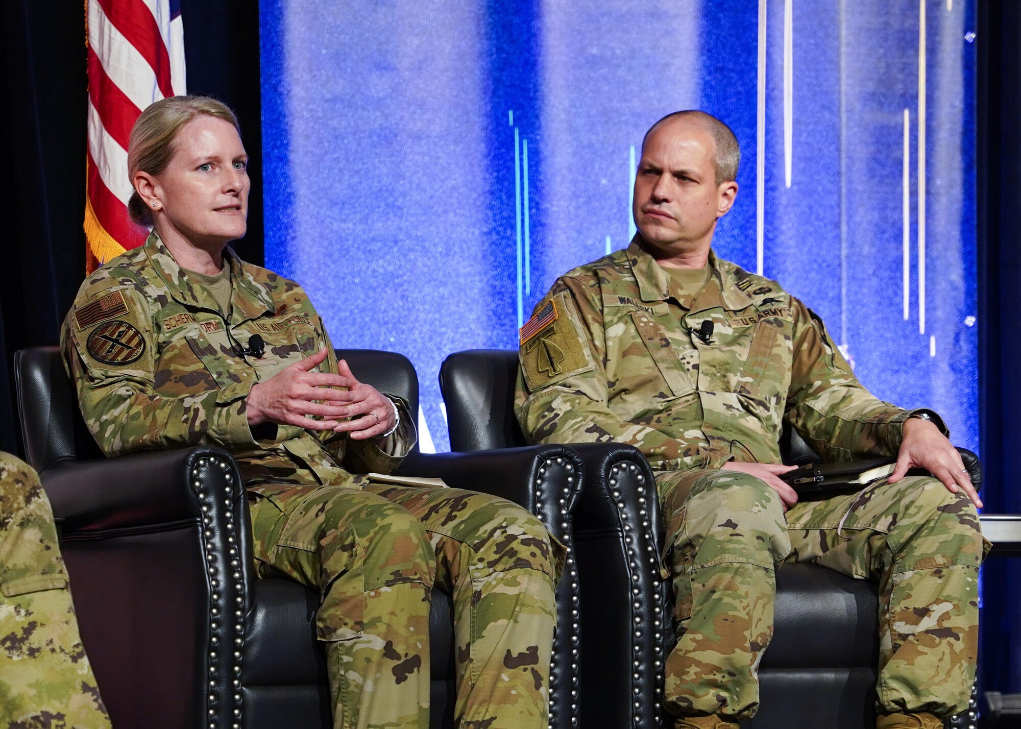 U.S. Air Force Colonel, Jocelyn Schermerhorn (left), Director of Operations, Air Force Special Operations Command, speaks to attendees of the annual Special Air Warfare Symposium and Expo.