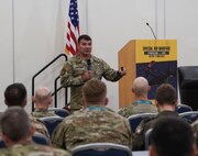 Maj. Gen. Wolfe Davidson greets attendees at the opening of the annual Special Air Warfare Symposium and Expo.