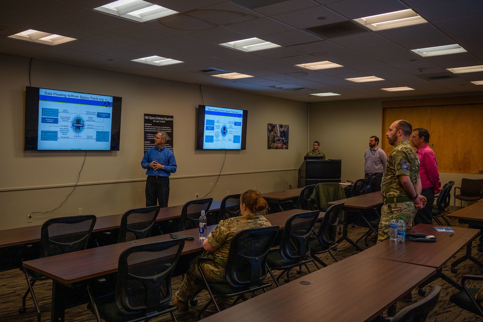 Members of the 18th Space Defense Squadron (18 SDS) go over details for Space-Track.org with two members from the U.K. Space Operations Center during an Operator Exchange at Vandenberg Space Force Base, Calif., Feb. 15, 2023. According to Space-Track.org, 18 SDS’s official website for tracking object in space, there are approximately 47,800 objects continuously being monitored and accounted for, a number that is continually growing. (U.S. Space Force photo by Tech. Sgt. Luke Kitterman)