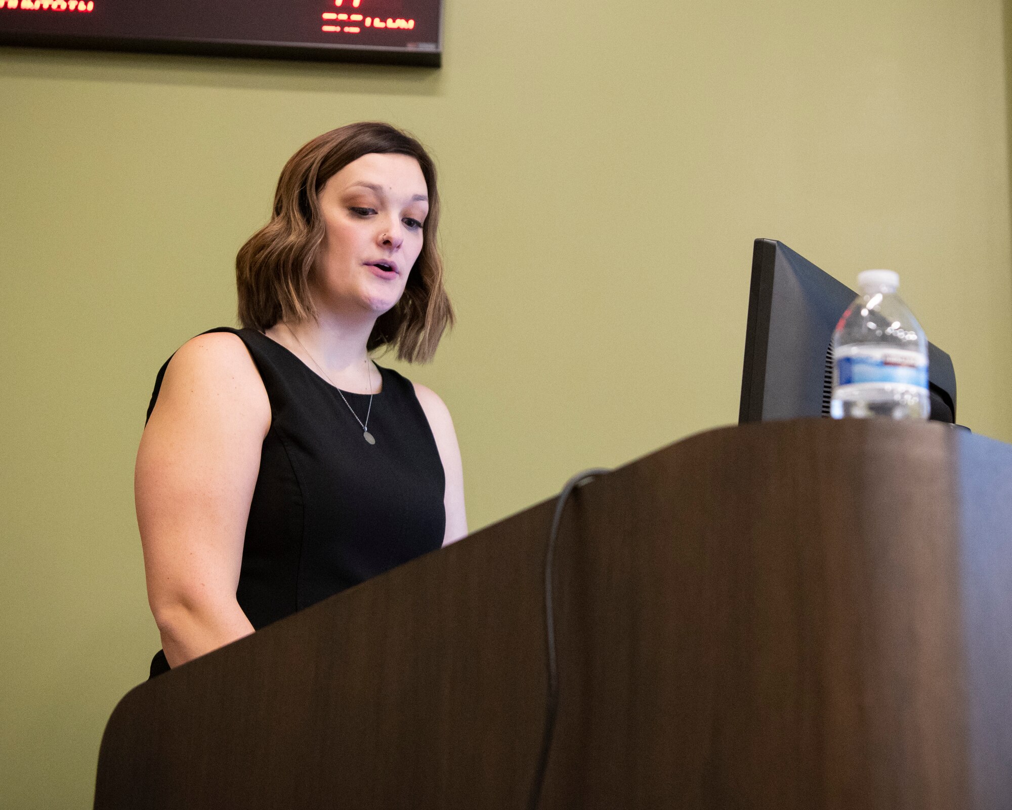 Katlyn Skelton, daughter of retired Chief Master Sgt. Scott E. Yoder, narrates her father's retirement ceremony.