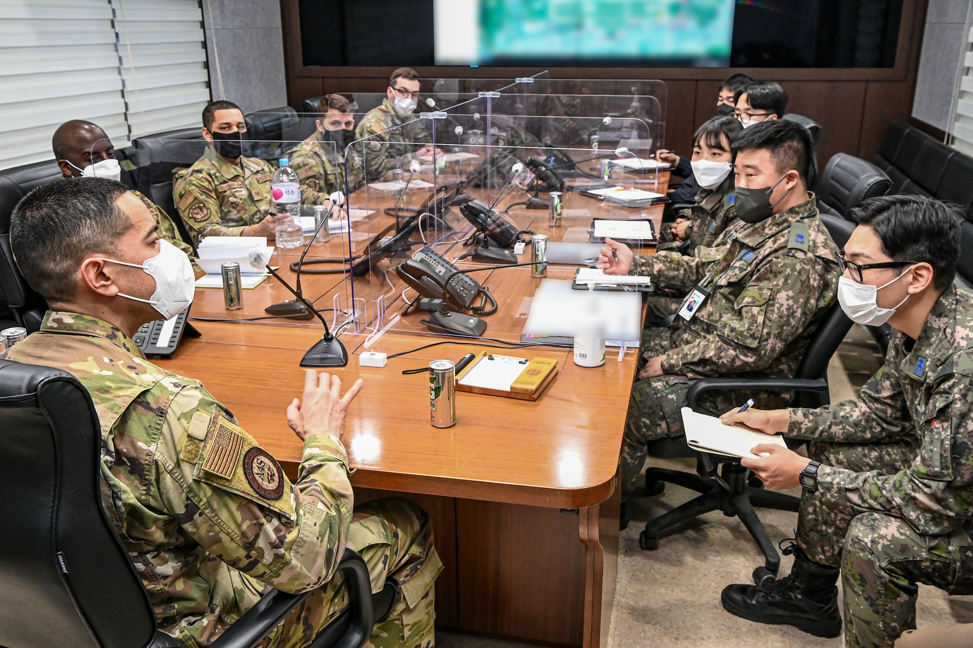 U.S. Air Force members from the 607th Materiel Maintenance Squadron Security Forces and the 7th Air Force, Force Protection Division, conduct a combined active-shooter tabletop exercise with Republic of Korea Air Force military police members at Daegu Air Base, Republic of Korea.