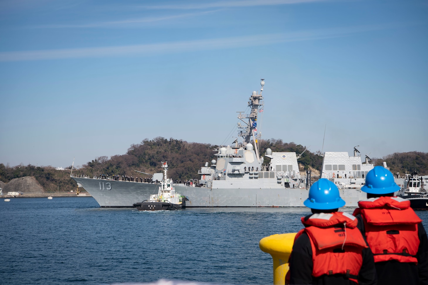 The Arleigh Burke-class guided-missile destroyer USS John Finn (DDG 113) arrives at Commander Fleet Activities Yokosuka (CFAY). Finn arrives from Naval Base San Diego to CFAY, becoming the latest forward-deployed asset in the U.S. 7th Fleet. For 75 years, CFAY has provided, maintained, and operated base facilities and services in support of the U.S. 7th Fleet's forward-deployed naval forces, tenant commands, and thousands of military and civilian personnel and their families. (U.S. Navy photo by Mass Communication Specialist 1st Class Kaleb J. Sarten)