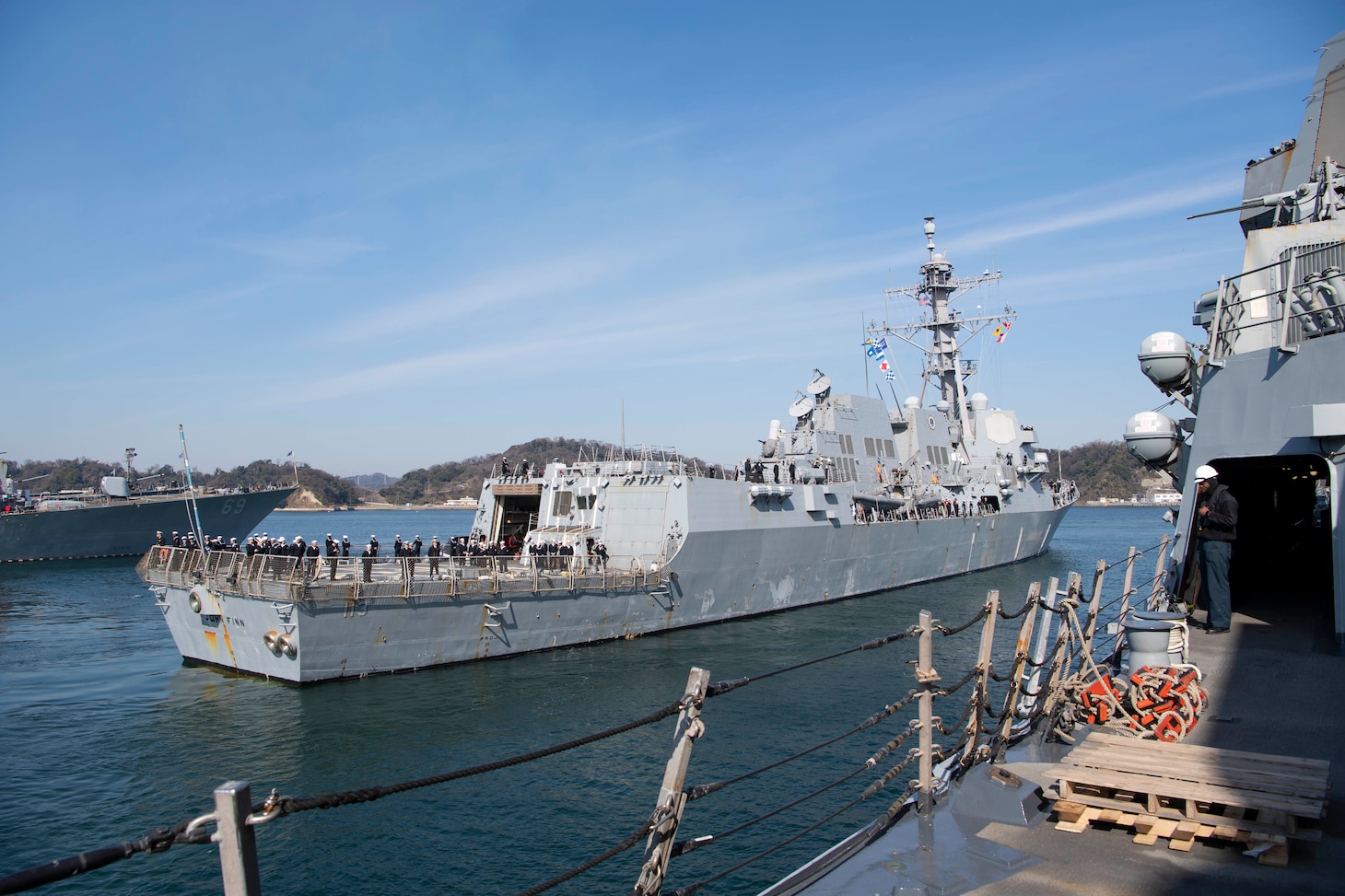 The Arleigh Burke-class guided-missile destroyer USS John Finn (DDG 113) arrives at Commander Fleet Activities Yokosuka (CFAY). Finn arrives from Naval Base San Diego to CFAY, becoming the latest forward-deployed asset in the U.S. 7th Fleet. For 75 years, CFAY has provided, maintained, and operated base facilities and services in support of the U.S. 7th Fleet's forward-deployed naval forces, tenant commands, and thousands of military and civilian personnel and their families. (U.S. Navy photo by Mass Communication Specialist 1st Class Kaleb J. Sarten)