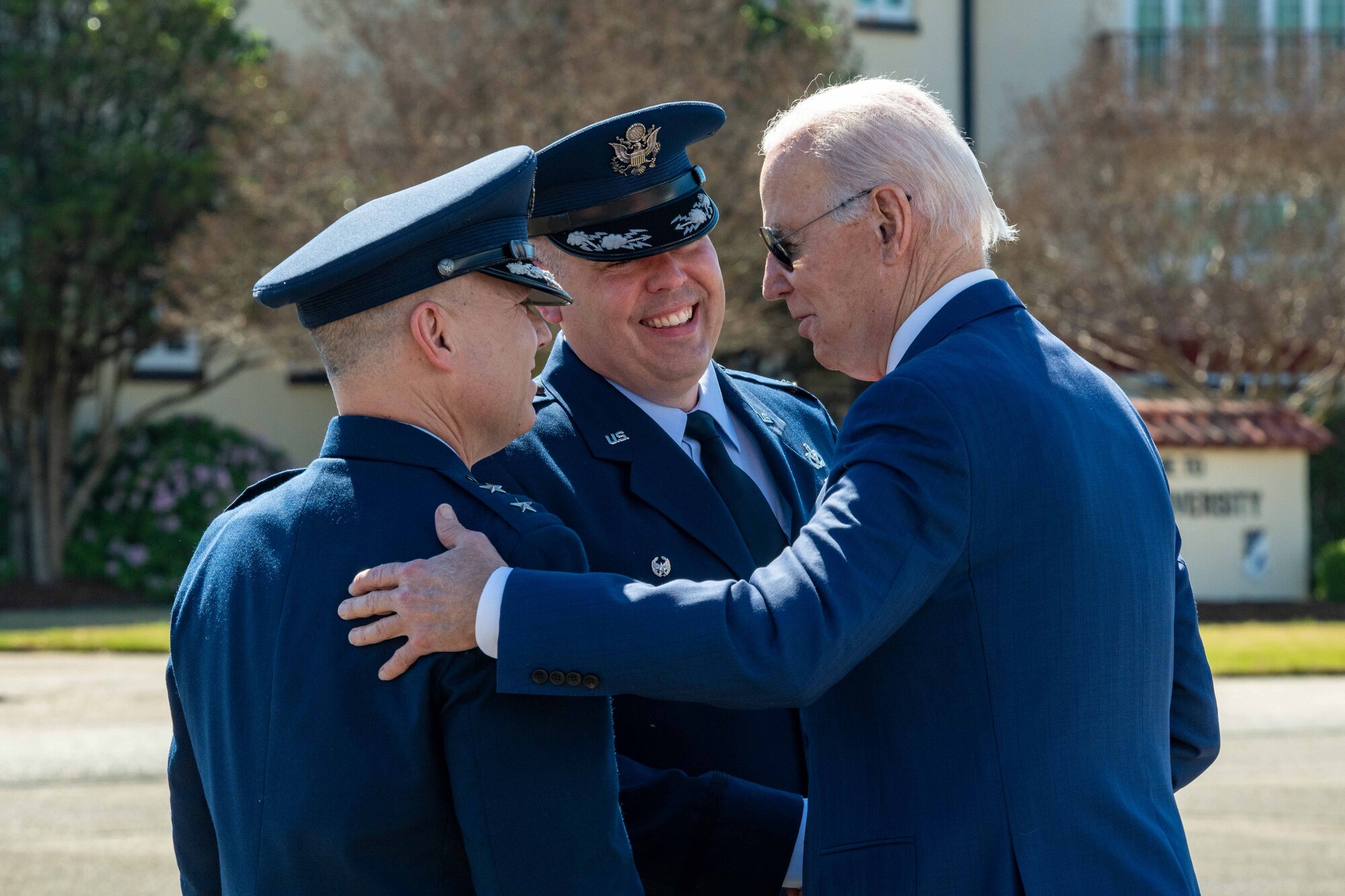 President Joe Biden greets Maj. Gen. William Holt and Col. Christopher Ledford at Maxwell Air Force Base, Mar. 5, 2023. Biden arrived at Maxwell in route to Selma to commemorate the 58th anniversary of Bloody Sunday.