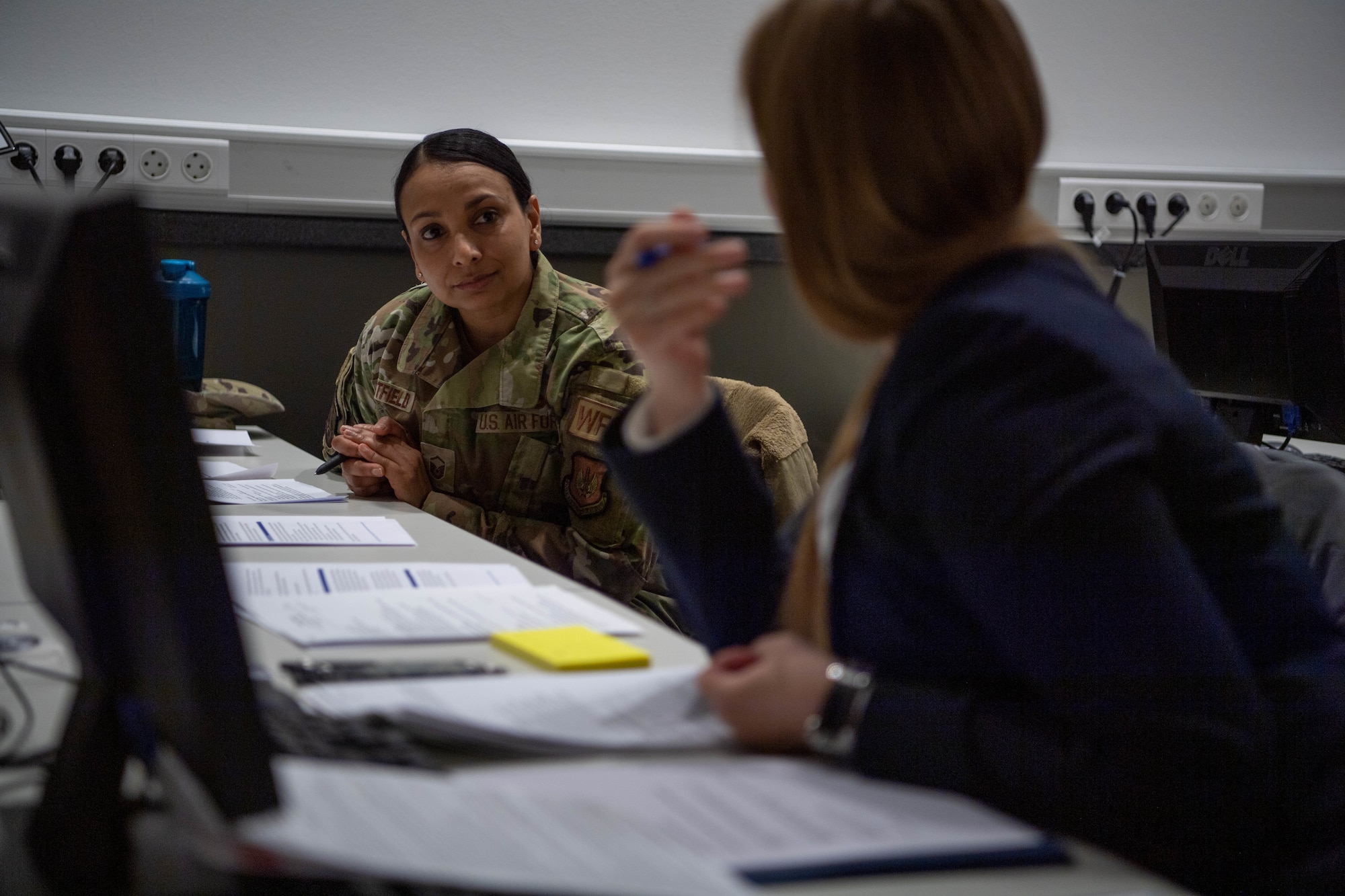 Master Sgt. Laura Westfield, 786th Civil Engineer Squadron customer service support superintendent, works on the hiring committee during a job fair at Ramstein Air Base, March 3, 2023.