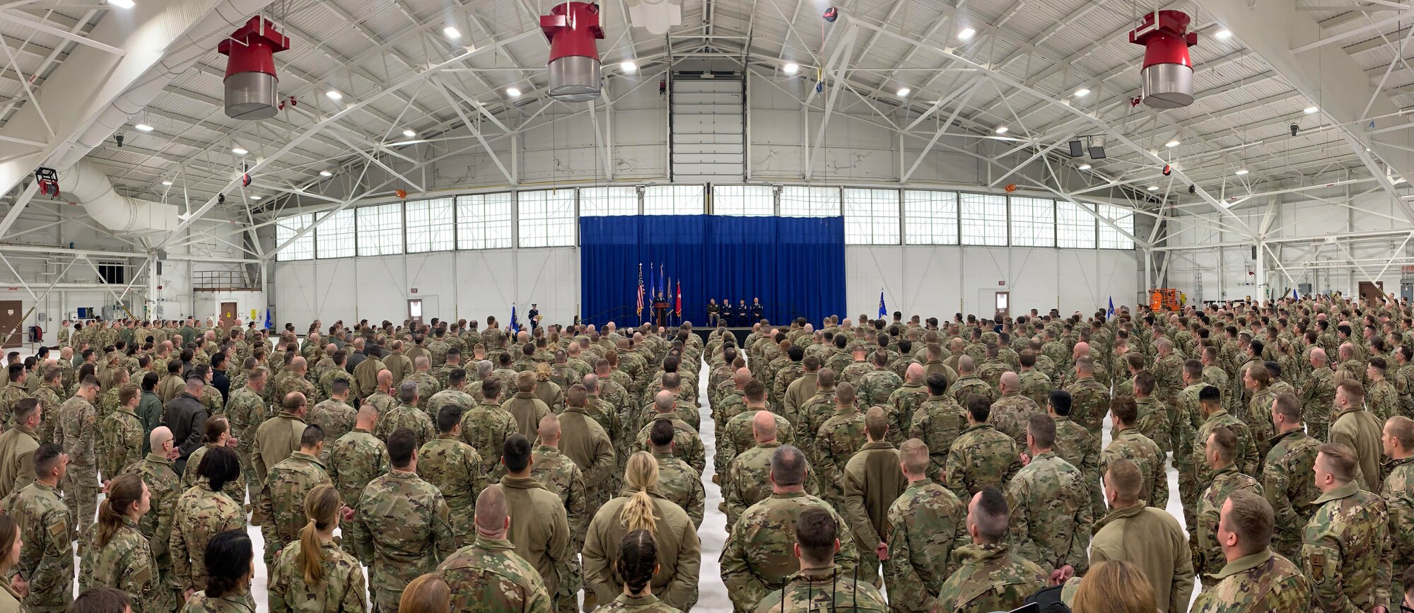 U.S. Air Force Airmen from the 133rd Airlift Wing, along with friends and family of U.S. Air Force Col's. Jesse Carlson and James Cleet gather for a change of command ceremony in St. Paul, Minn., March 4, 2023.