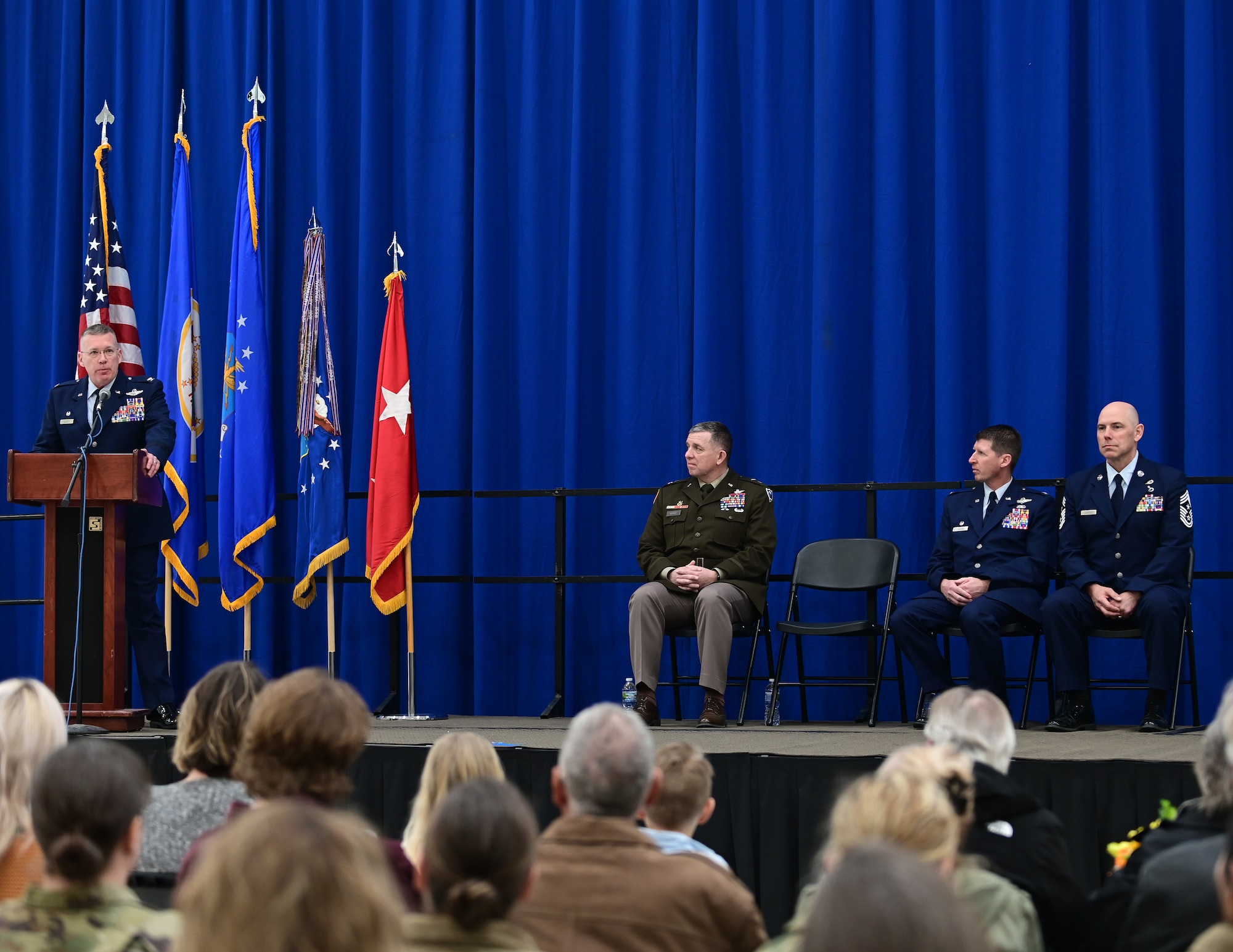 U.S. Air Force Col. James Cleet, 133rd Airlift Wing commander, speaks to Airmen, family, and friends before relinquishing command in St. Paul, Minn., March 4, 2023.