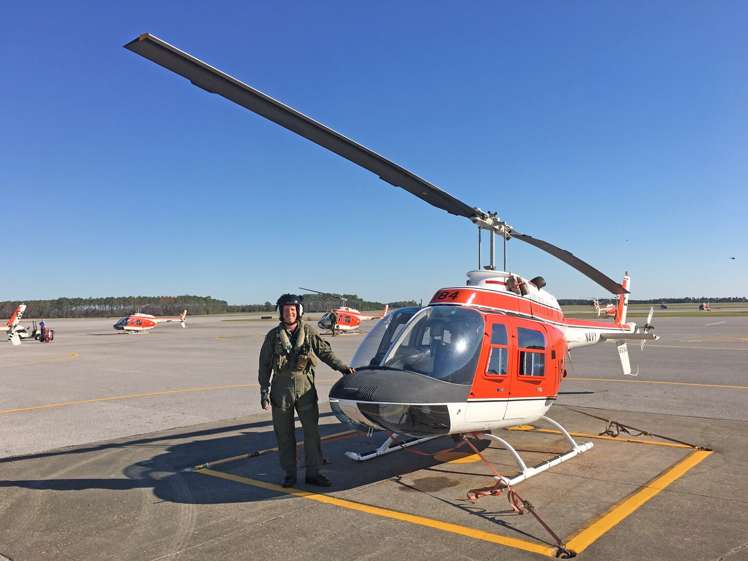 Lt. Cmdr. David Rozovski poses after his visual flight solo in advanced flight training at Naval Air Station Whiting Field, Florida, in February 2017.