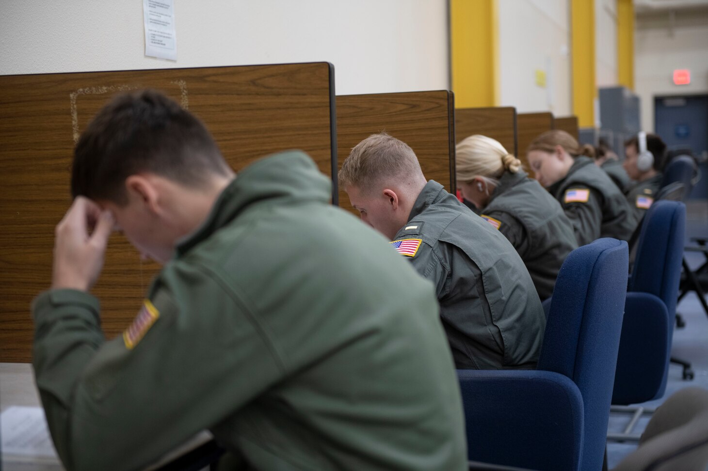Student Naval Aviators study and prepare on the ground ahead of inflight training.