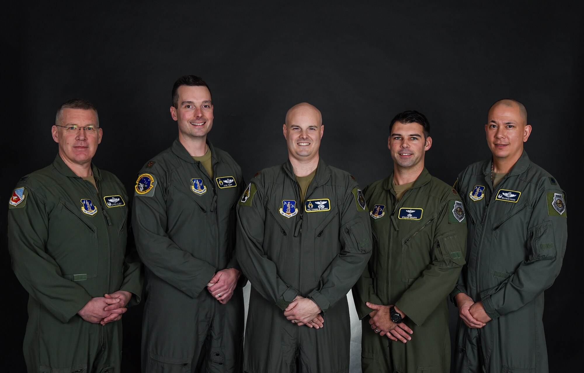 U.S. Air Force Col. James Cleet, left, Maj. Brian Tripp, Maj. Charlie Moore, center, Maj. William Brama, and Lt. Col. Brandon Moore pose for a group photo in St. Paul, Minn., Jan. 3, 2023.