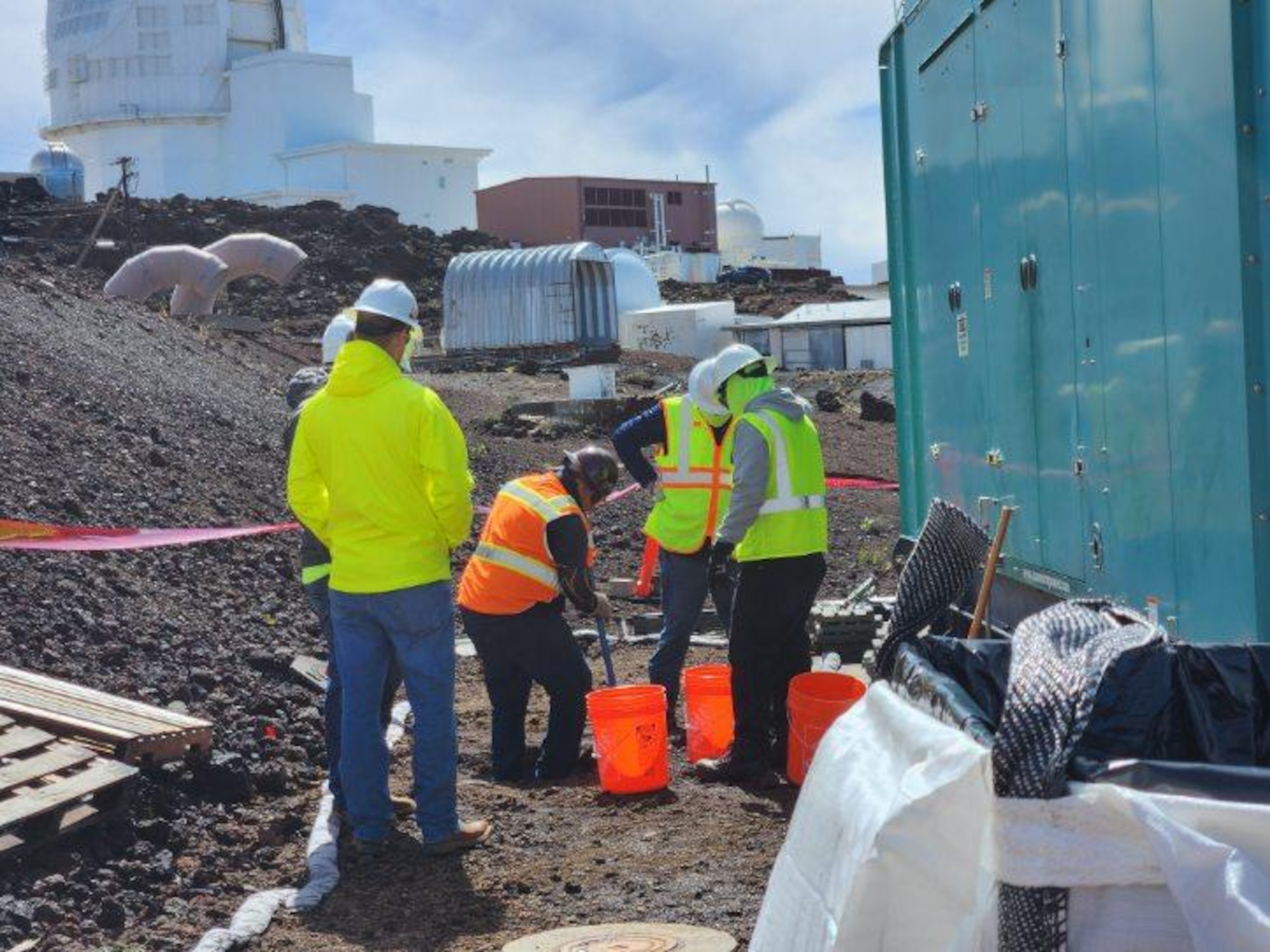 Photo of contractors working a remediation effort in Hawaii.