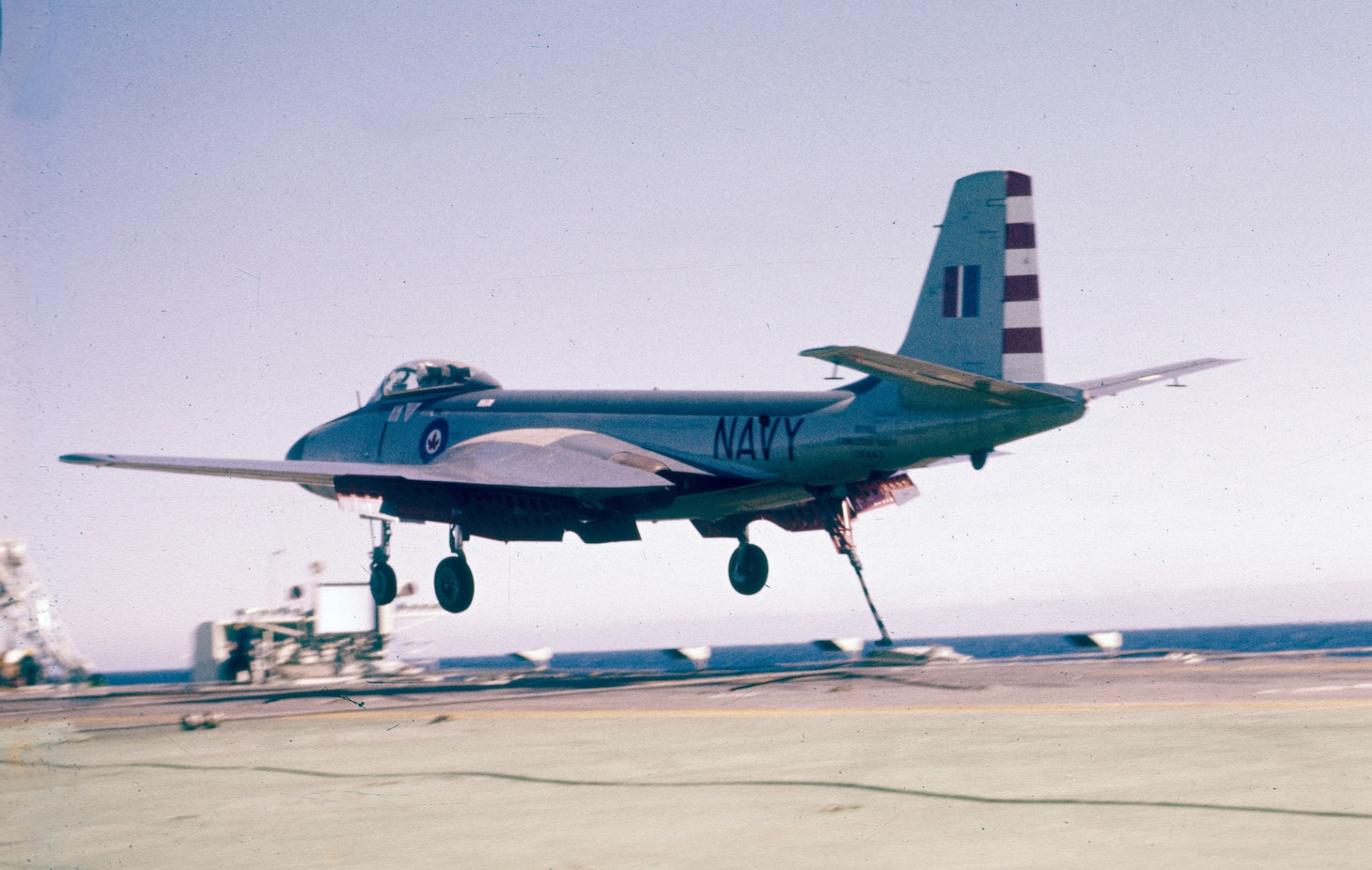 A VF-871 F2H-3 comes aboard the HMCS Bonaventure (CVL 22) in 1958. In March 1959, this squadron merged with VF-870 when attrition made a single squadron more practical.