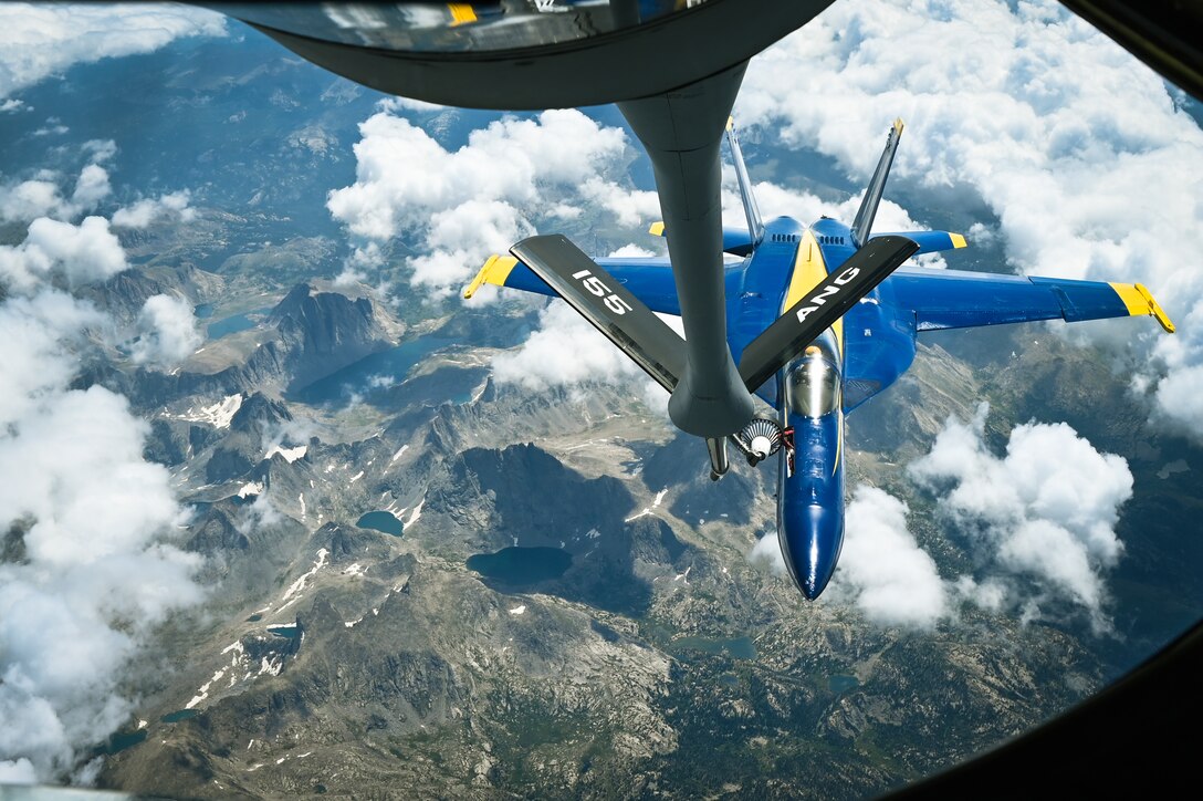 A U.S. Navy Blue Angel F/A-18E Super Hornet receives fuel from the 155th Air Refueling Wing, Aug. 3, 2022