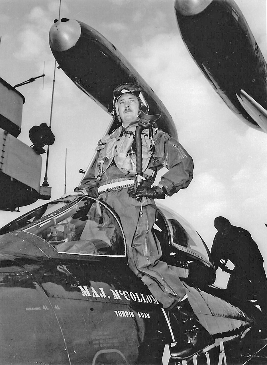 Lt. j.g. Dick Bellinger of Fighter Squadron (VF) 172 poses on one of the squadron’s F2H-2s in 1952 on board the USS Essex (CV 9) in 1952 during its combat deployment to Korea. The aircraft was assigned to U.S. Air Force exchange pilot Maj. Francis N. McCollom, who was killed when his F2H-2 by anti-aircraft artillery on Jan. 19, 1952. Bellinger went on to command VF-162 flying F-8E Crusaders aboard the USS Oriskany (CVA 34) and shoot down a North Vietnamese MiG-21 on Oct. 9, 1966.
