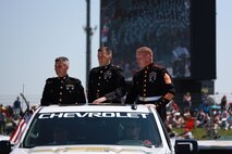 U.S. Marines from Recruiting Station Indianapolis participate in the opening ceremony of the Indianapolis 500 on 29 May, 2022. The Marines were invited to participate by the Indiana National Guard as a way to honor the men and women who serve our country. (U.S. Marine Corps photo by Cpl Joseph Exner)