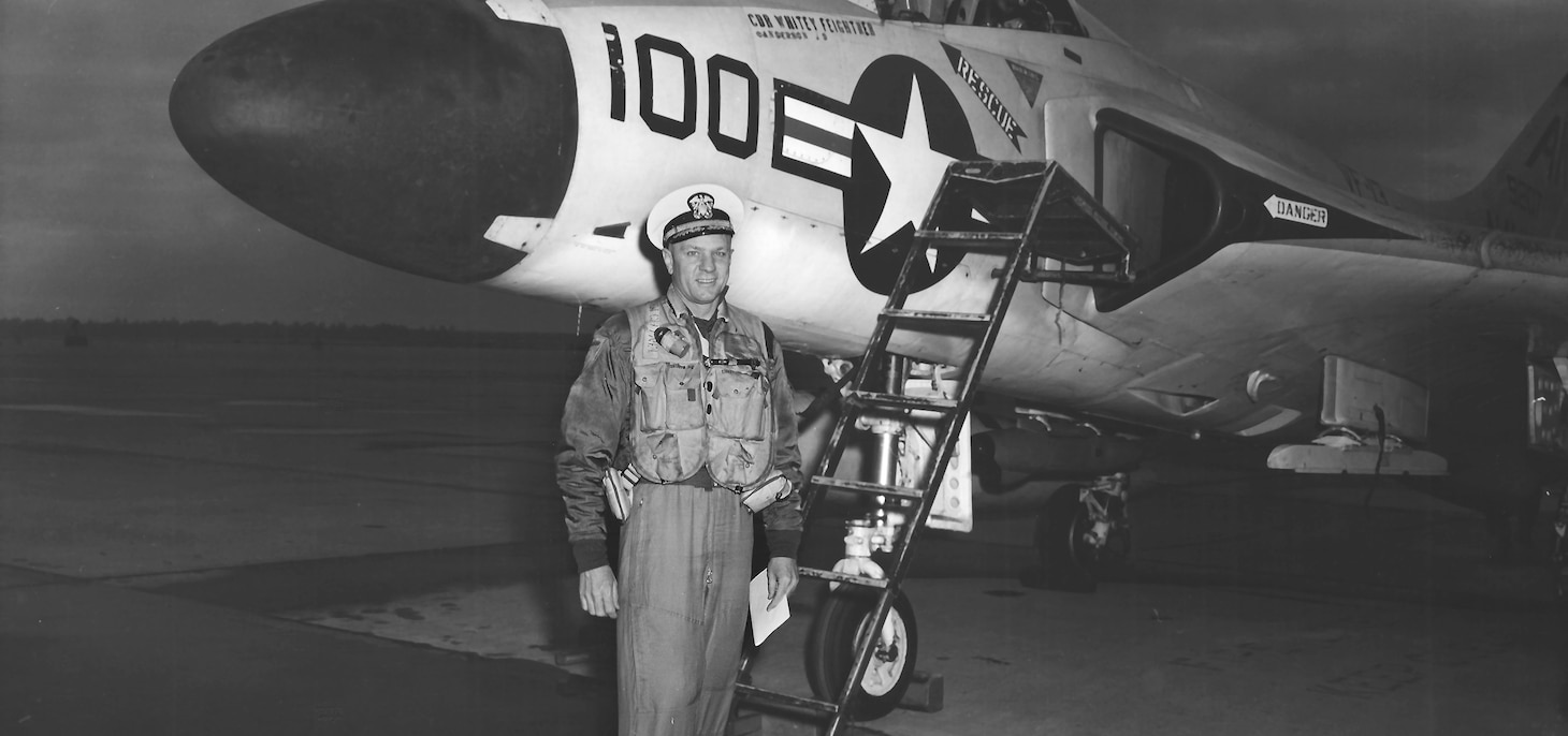 Then Cmdr. (later Rear Adm.) E.L. “Whitey” Feightner beside his F4D after returning from a 1960 Mediterranean cruise in the Essex as the Carrier Air Wing (CVG) 10 wing commander. Note his name below the Skyray’s windscreen. Flying F4F Wildcats with VF-10 then F6F Hellcats with VF-8 during WWII, he shot down nine confirmed Japanese aircraft. He went on to be a test pilot at Naval Air Station Patuxent River, Maryland. then flew with the Blue Angels, commanded VF-11 flying Banshees, before serving as the commanding officer of the USS Okinawa (LPH 3). In this photo, he wears, somewhat unconventionally, his white cover with his flight gear on the flight line. But then, as the saying goes, “He’s CAG!”  An affable and highly-respected naval officer, as well as highly-experienced naval aviator in war and peace, Whitey reached his 100th birthday in October 2019 before passing away a few months later.
