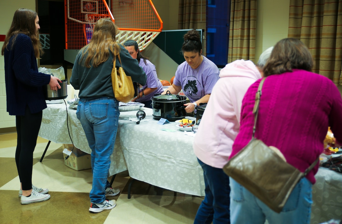 The Military Spouses’ Club of Albany is a nonprofit organization functioning largely within Marine Corps Logistics Base Albany. Its mission is to provide enrichment and support to military, military families and the Albany area community. One of the most visible signs of this has been the monthly Dinner at the Barracks events feeding dozens of young Marines residing in MCLB Albany’s barracks facility. (U.S. Marine Corps photo by Jennifer Parks)