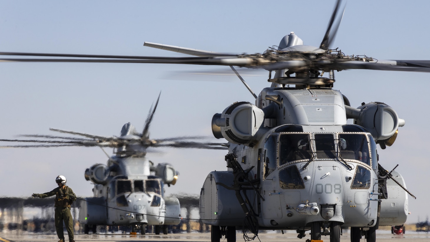 U.S. Marines with Marine Heavy Helicopter Squadron (HMH) 461 prepare for takeoff in CH-53K King Stallions at Mountain Home Air Force Base, Idaho, Aug. 16.