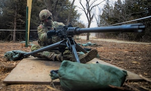 U.S. Army Spc. Carson Mason, an infantryman in Headquarters and Headquarters Company, 1st Battalion, 16th Infantry Regiment, 1st Armored Brigade Combat Team, 1st Infantry Division, performs a weapons check and operates an M2 machine gun during “E3B” training on Fort Riley, Kansas, March 2, 2023. “E3B” is a training and qualification period for the Expert Soldier Badge, Expert Infantryman Badge and Expert Field Medical Badge. (U.S. Army photo by Spc. Kenneth Barnet)