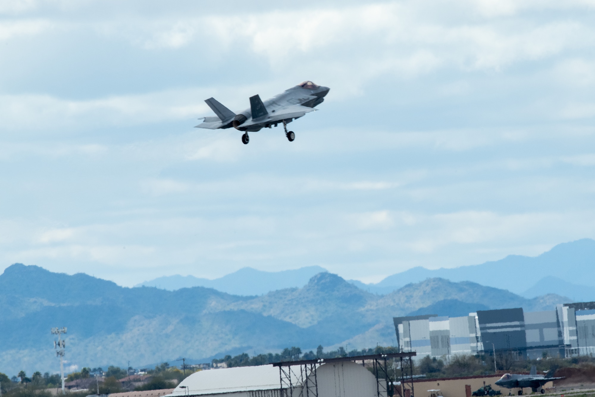 An F-35 Lightning II assigned to the 56th Fighter Wing takes off over Luke Air Force Base, Arizona, Mar. 3, 2023.