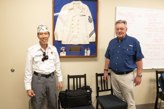 Ron Lam, left, first vice commander of the American Veterans of Hawaii, and Jim Brueckner, great nephew of Medal of Honor recipient U.S. Navy Chief Petty Officer John W. Finn, pose for a photo during a visit to Marine Corps Base Hawaii, Feb. 27, 2023. The visit provided a visual and historic understanding of the attacks that occurred on Naval Air Station Kaneohe Bay on Dec. 7, 1941, in which Finn’s acts of heroism earned him the Congressional Medal of Honor. (U.S. Marine Corps photo by Cpl. Chandler Stacy)