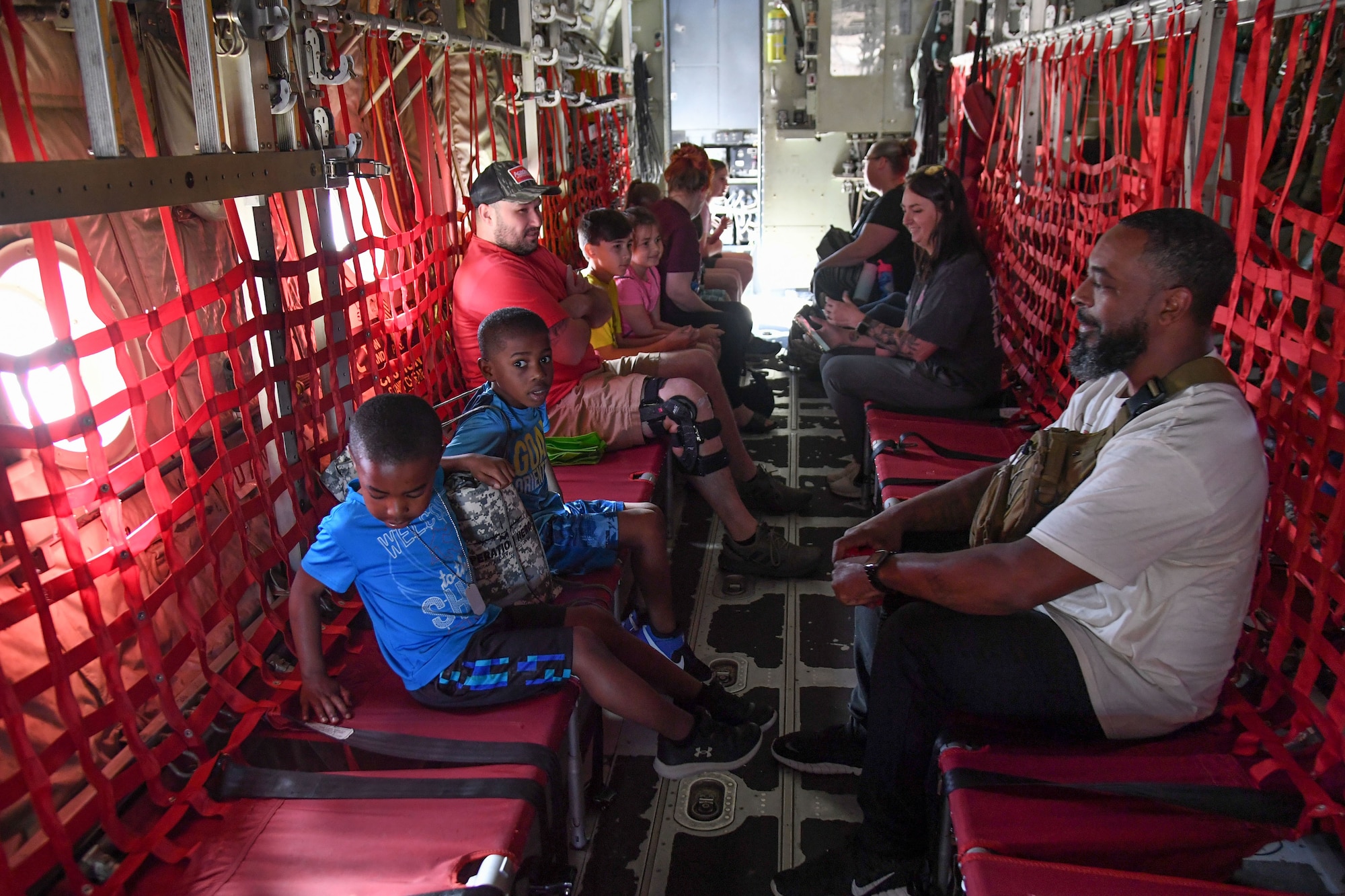 Keesler families tour a WC-130 Hercules during Operation Hero at Keesler Air Force Base, Mississippi, March 4, 2023.