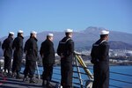 Sailors from the Arleigh Burke-class guided-missile destroyer, USS Rafael Peralta (DDG 115), man the rails as the ship makes a scheduled port visit to Jeju, Republic of Korea, Feb. 27. Rafael Peralta is assigned to Commander, Task Force 71/Destroyer Squadron (DESRON) 15, the Navy’s largest forward-deployed DESRON and the U.S. 7th Fleet’s principal surface force.