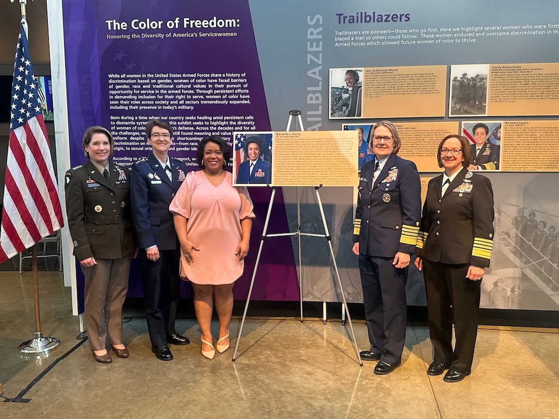 Tenecia Harris, center, stands next to a portrait of her mother, Air Force Maj. Gen. Marcelite Harris, along with the Defense Department’s top female military leaders March 6, 2023, at the Military Women’s Memorial in Arlington, Virginia. Maj. Gen. Harris was the first African American woman to become a general officer in the U.S. Air Force. As part of Women’s History Month, Maj. Gen. Harris’ photo was added to the memorial’s Color of Freedom exhibit