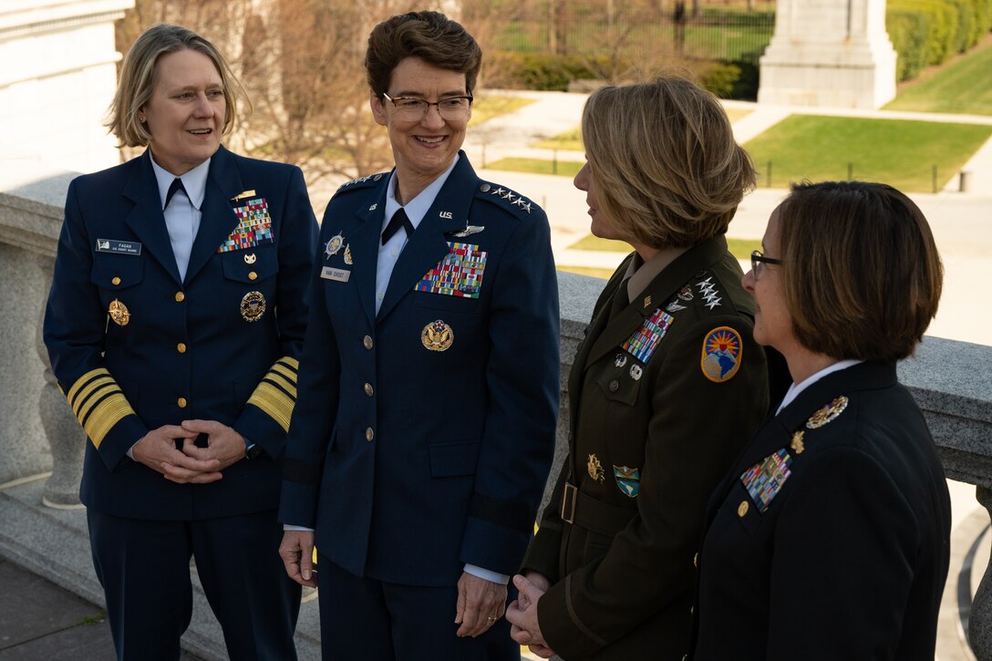 Left to right: U.S. Coast Guard Adm. Linda Fagan, Coast Guard commandant, U.S. Air Force Gen. Jacqueline Van Ovost, U.S. Transportation Command commander, U.S. Army Gen. Laura Richardson, U.S. Southern Command commander, and U.S. Navy Adm. Lisa Franchetti, vice chief of Naval Operations, meet for the first time before a Women's History Month panel discussion at the Military Women's Memorial in Arlington National Cemetery, Arlington, Va., March 6, 2023.