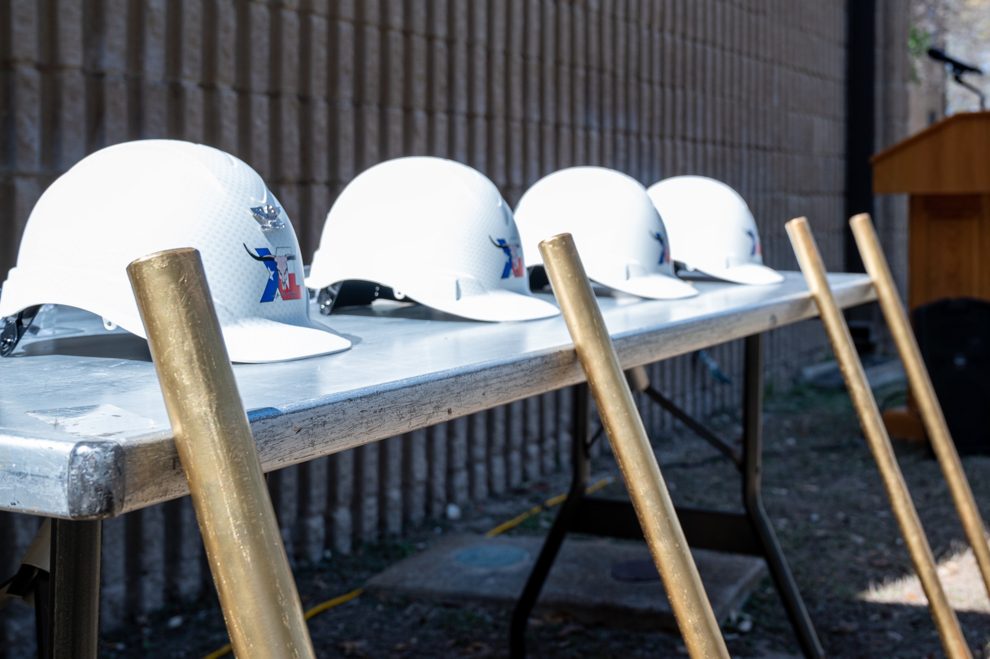 A set of helmets and hammers sit on a table, awaiting to be welded to bring in the new renovation of Ricks Hall dormitory at Laughlin Air Force Base, Texas, on Mar. 06, 2023.  The Air Force Civil Engineer Center funded this $35.3 million project. It will contribute to improving the base and give Airmen the ability to perform better by going home to a comfortable living space at the end of their day. (U.S. Air Force photo by Senior Airman David Phaff)