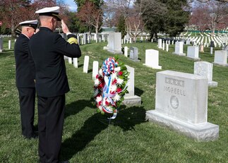 Rear Adm. Dean Vanderley and Force Master Chief Petty Officer of the Seabees Lawrence Sharpe salute during a Seabee birthday wreath-laying ceremony at the gravesite of Adm. Ben Moreell.