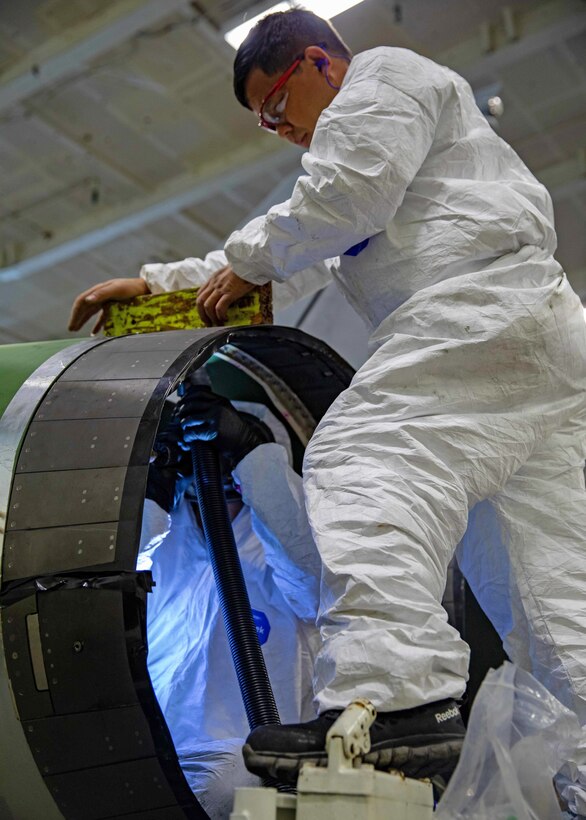 221216-N-IX644-1046 ADRIATIC SEA (Dec. 16, 2022) Paul Tran, left, and Thanh Nguyen, assigned to Fleet Readiness Center Southwest, drill composite on an F/-18E Super Hornet aircraft attached to Strike Fighter Squadron (VFA) 136, aboard the Nimitz-class aircraft carrier USS George H. W. Bush (CVN 77), Dec. 16, 2022. Carrier Air Wing (CVW) 7 is the offensive air and strike component of Carrier Strike Group 10, George H.W. Bush Carrier Strike Group (GHWBCSG). The squadrons of CVW-7 are VFA-86, VFA-103, VFA-136, VFA-143, Electronic Attack Squadron (VAQ) 140, Carrier Airborne Early Warning Squadron (VAW) 121, Helicopter Sea Combat Squadron (HSC) 5, and Helicopter Maritime Strike Squadron (HSM) 46. The GHWBCSG is on a scheduled deployment in the U.S. Naval Forces Europe area of operations, employed by U.S. Sixth Fleet to defend U.S., allied and partner interests. (U.S. Navy photo by Mass Communication Specialist Seaman Sasha Ambrose)