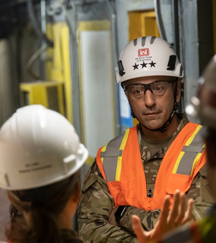 U.S. Army Lt. Gen. Scott A. Spellmon, 55th Chief of Engineers and Commanding General of the U.S. Army Corps of Engineers, listens to U.S. Army Brig. Gen. Michelle Link, deputy commander Joint Task Force-Red Hill (JTF-RH), during a tour at Red Hill Bulk Fuel Storage Facility (RHBFSF), Halawa, Hawaii, Feb. 24, 2023. The tour involved details of the facility to better align contracted work on the routine maintenance and minor repairs. (U.S. Marine Corps photo by Sgt. Sarah Stegall)