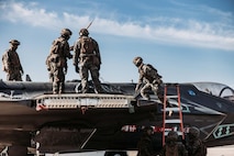 U.S. Marines with Combat Logistics Battalion (CLB) 24, Combat Logistics Regiment 2, 2nd Marine Logistics Group, prepare an F-35C Lightning II airframe for Helicopter Support Team operations at Naval Air Station Patuxent River, Md., Dec. 13, 2022. CLB-24 helicopter support team Marines conducted external lift operations of the carrier variant to develop tactics, techniques, and procedures of CH-53K King Stallion. (U.S. Marine Corps photo by Cpl. Meshaq Hylton)