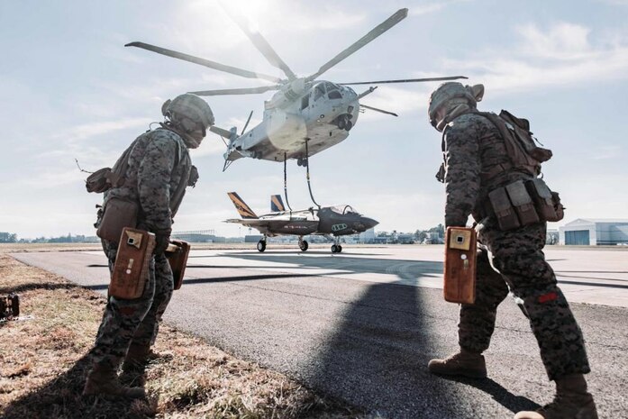 U.S. Marines with Combat Logistics Battalion (CLB) 24, Combat Logistics Regiment 2, 2nd Marine Logistics Group, prepare an F-35C Lightning II airframe for Helicopter Support Team operations at Naval Air Station Patuxent River, Md., Dec. 13, 2022. CLB-24 helicopter support team Marines conducted external lift operations of the carrier variant to develop tactics, techniques, and procedures of CH-53K King Stallion. (U.S. Marine Corps photo by Cpl. Meshaq Hylton)