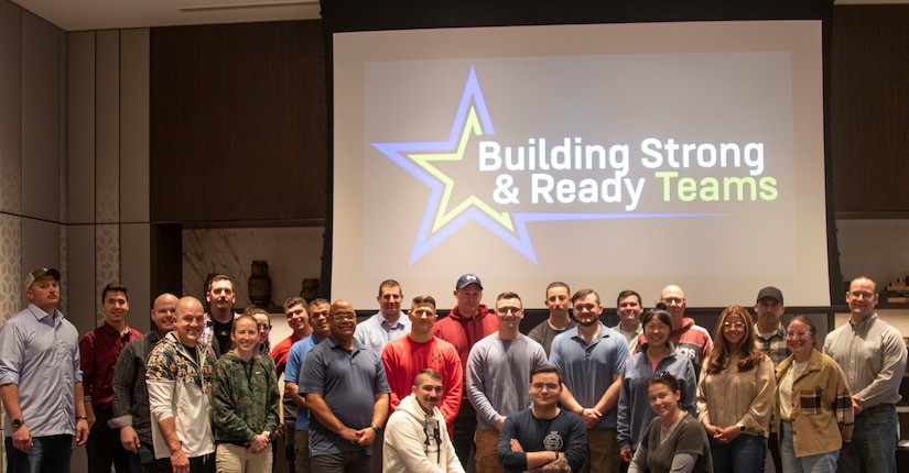 Soldiers from the 28th Infantry Division pose for a photo after a successful Building Strong & Ready Teams seminar at Grand Hyatt Kuwait. BSRT is an initiative that improves the spiritual preparedness of all Soldiers, regardless of rank, and their families. (U.S. Army photo by Sgt. Gabriel Washington)