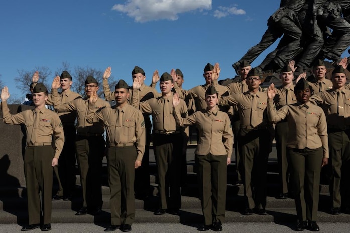 U.S. Marine Corps Gen. Eric M. Smith, Assistant Commandant of the Marine Corps, swears in Marines at the Marine Corps War Memorial in Arlington, Va. on Feb. 23, 2023. U.S. Marines from 2nd Marine Logistics Group participated in a reenlistment ceremony on the 78th anniversary flag raising atop Mount Suribachi, during the Battle for Iwo Jima. (U.S. Marine Corps photo by Lance Cpl. Alfonso Livrieri)