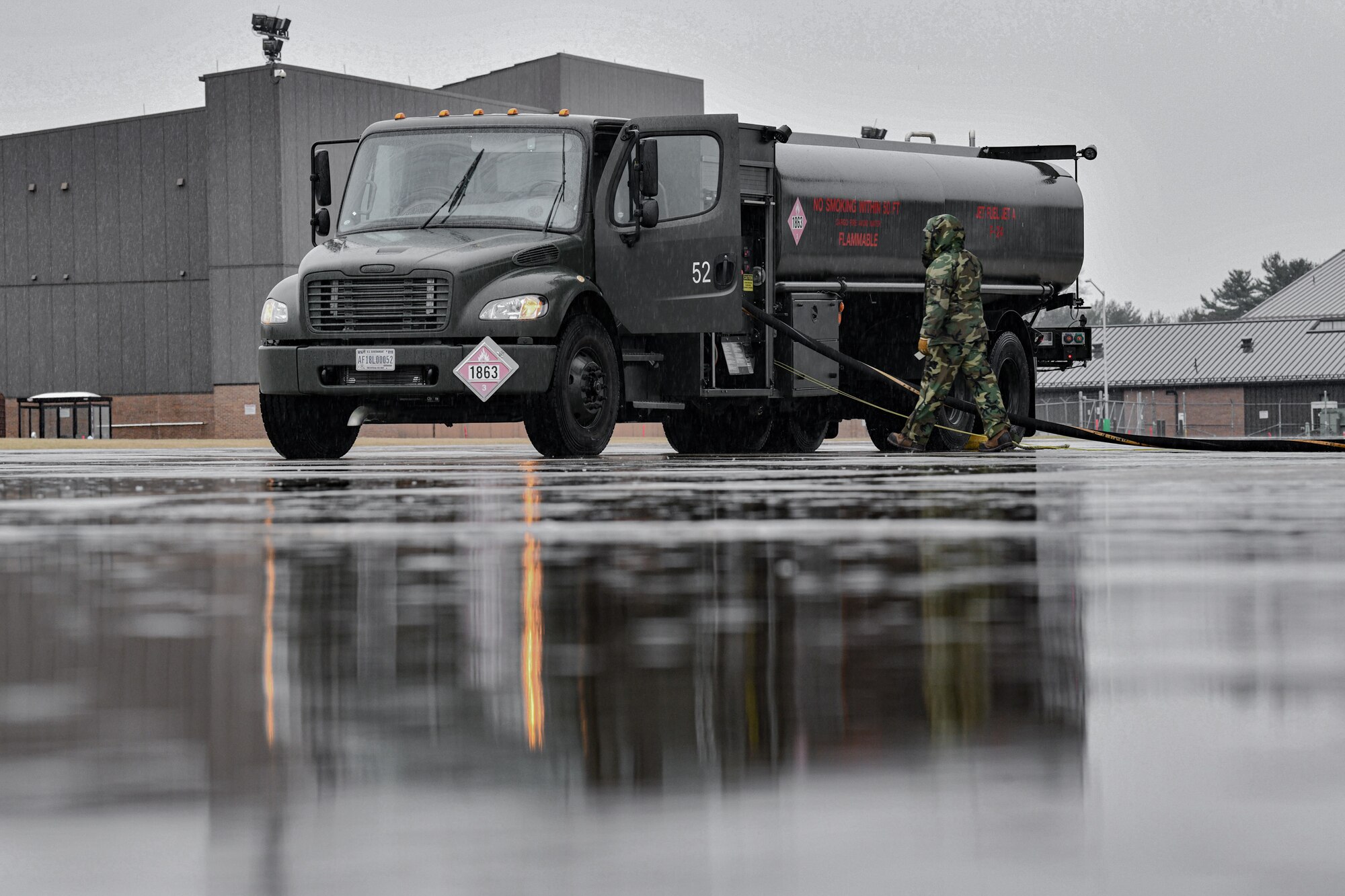 Al Biscotti, a DoD fuels contractor with the 910th Logistics Readiness Squadron, refuels a C-130H Hercules on Feb. 16, 2023, on the flight line at Youngstown Air Reserve Station, Ohio.