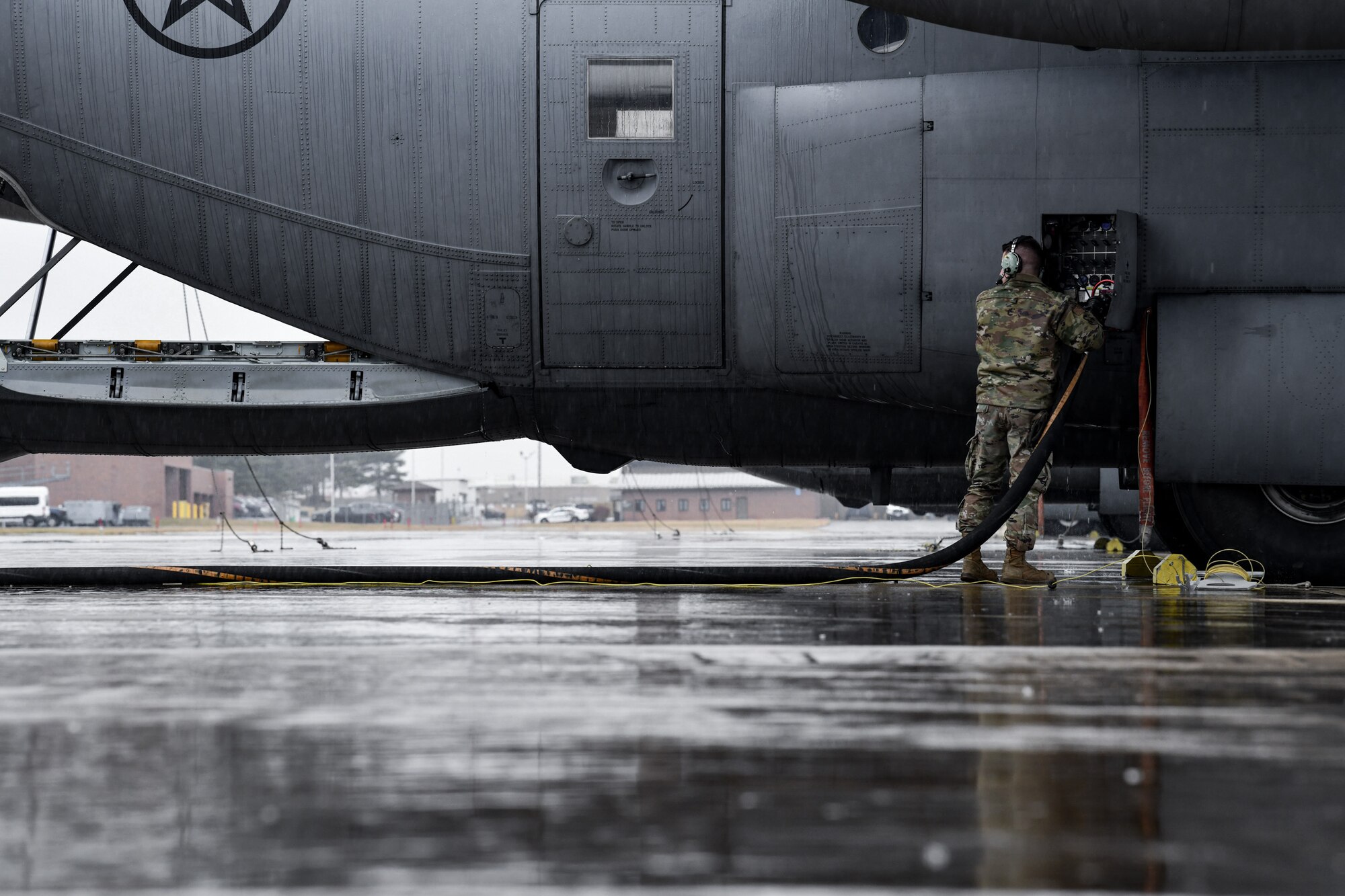Senior Airman Creston Shirey, an aerospace maintenance journeyman assigned to the 910th Aircraft Maintenance Squadron, refuels a C-130H Hercules on Feb. 16, 2023, on the flight line at Youngstown Air Reserve Station, Ohio.