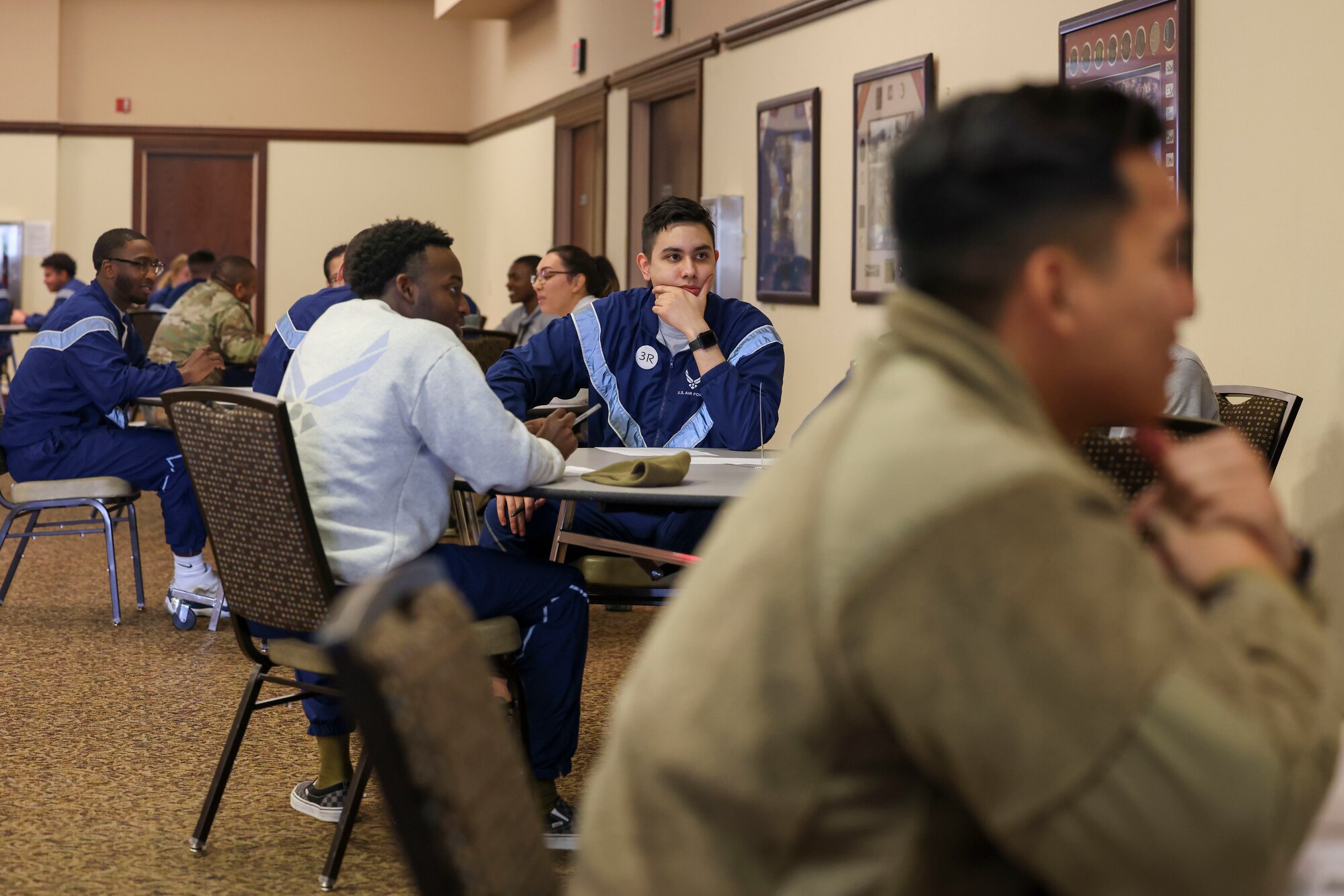 Beale Airmen interact with each other during the Beale Social on Feb. 27, 2023, at Beale Air Force Base, Calif.