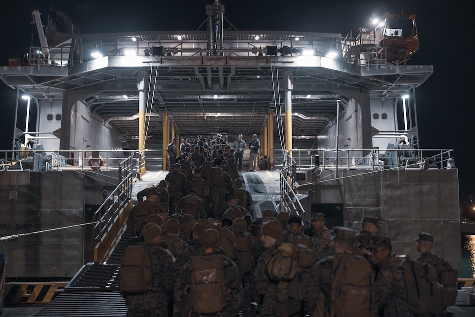 U.S. Marines with III Marine Expeditionary Force embark the high-speed transport vessel USNS Guam (T-HST 1) at Naha Military Port, Okinawa, Japan, March 3, 2023. The USNS Guam will transport Marines to the Republic of Korea for exercise Freedom Shield 23. Freedom Shield is a defense-oriented exercise designed to strengthen the ROK-U.S. Alliance, enhance our combined defense posture, and strengthen security and stability on the Korean peninsula. (U.S. Marine Corps photo by Lance Cpl. Tyler Andrews)